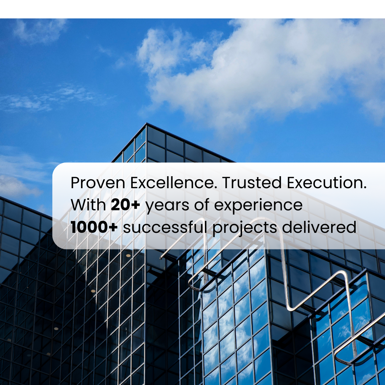 Modern glass building with text overlay about proven excellence and project delivery. Menko services pvt ltd