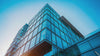 Modern business tower with reflective glass facade